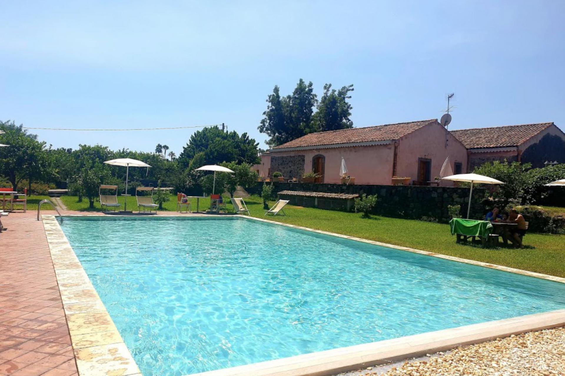 Agriturismo among citrus trees in Sicily